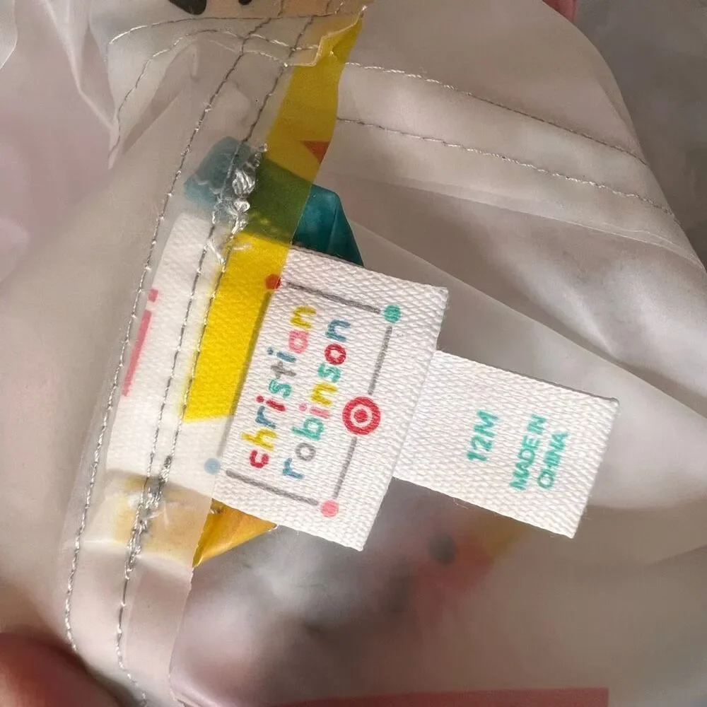 toddler rain poncho featuring a colorful character design from a Christian Robin
